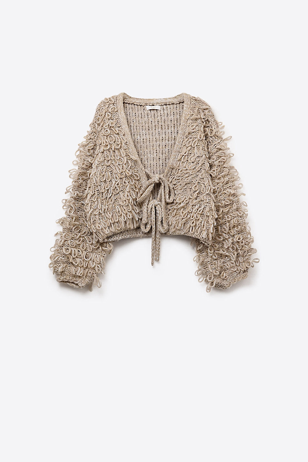Cardigan croisé en maille épaisse beige avec col en V et fermeture à nouer sur le devant