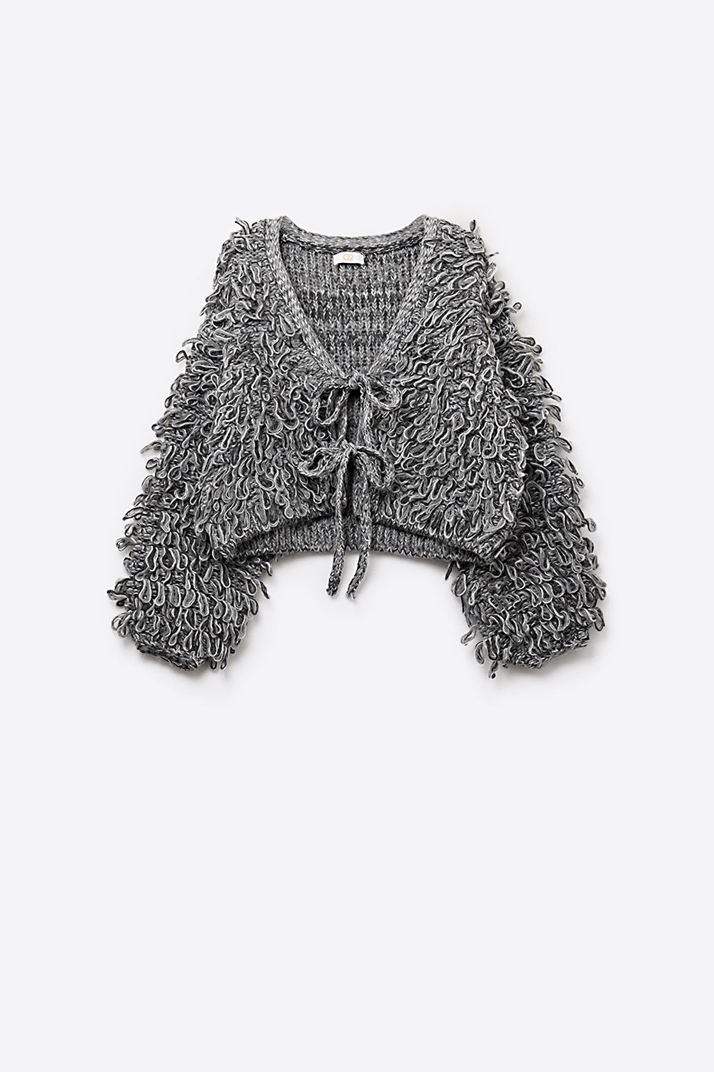 Gilet court beige en grosse maille col en V et fermeture à nouer sur le devant