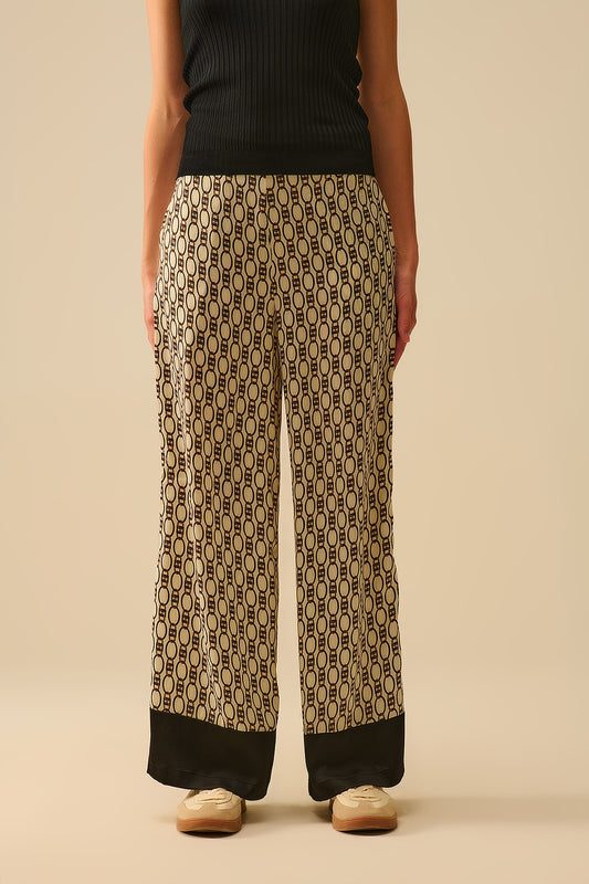 Pantalon imprimé à jambe large avec motif de chaîne