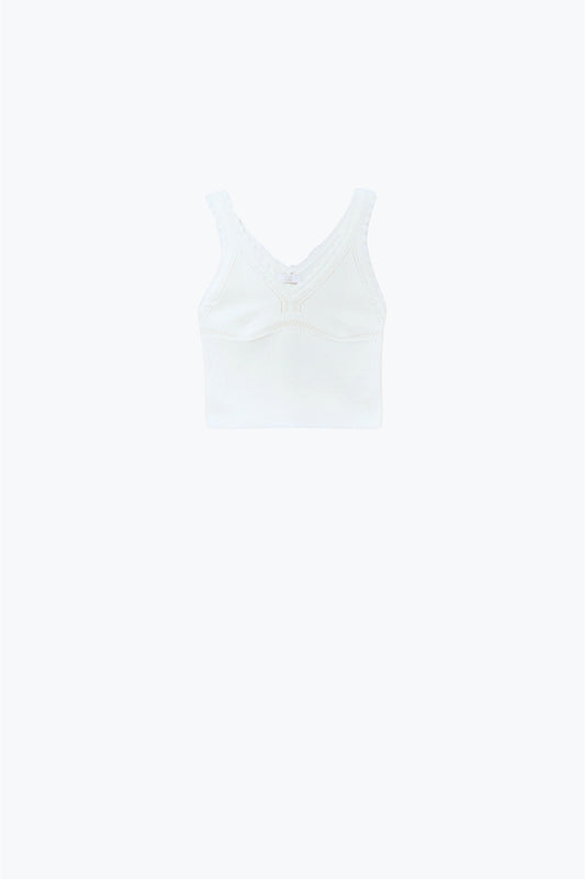 Top à col en V en tricot blanc avec bords festonnés