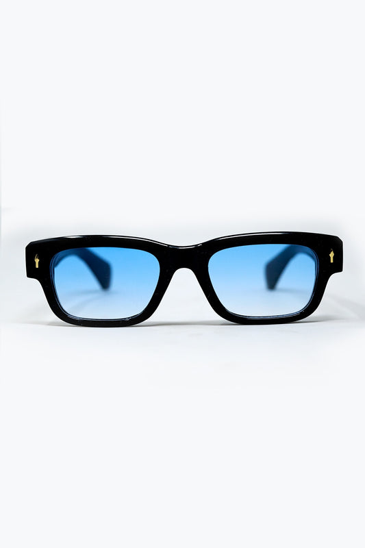 Lunettes de soleil noires à monture ovale avec détails dorés et verre bleu