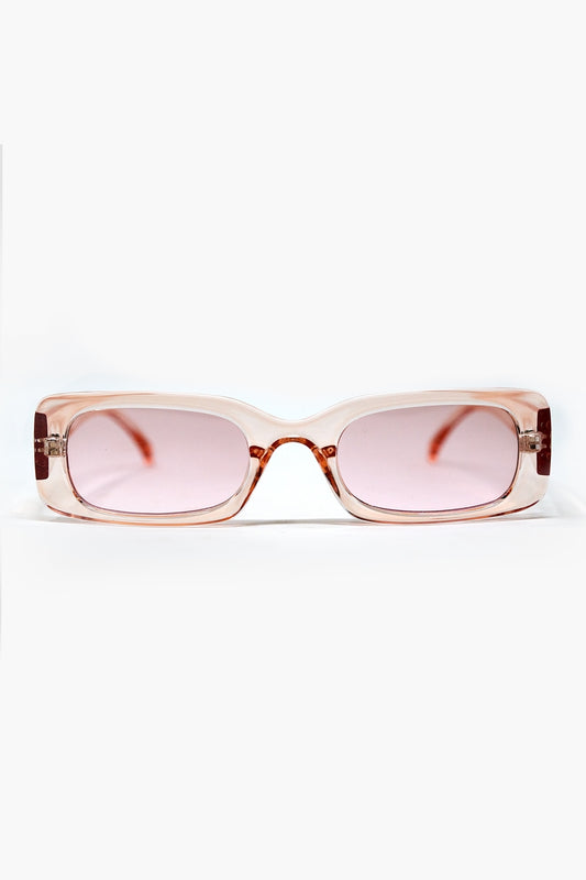 Lunettes de soleil rectangulaires roses transparentes avec verres fumés roses