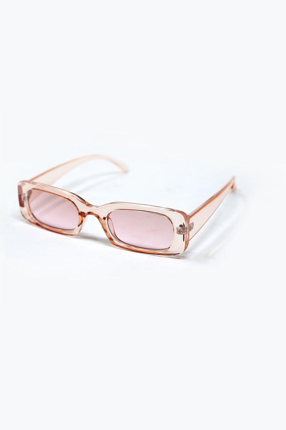 Lunettes de soleil rectangulaires roses transparentes avec verres fumés roses