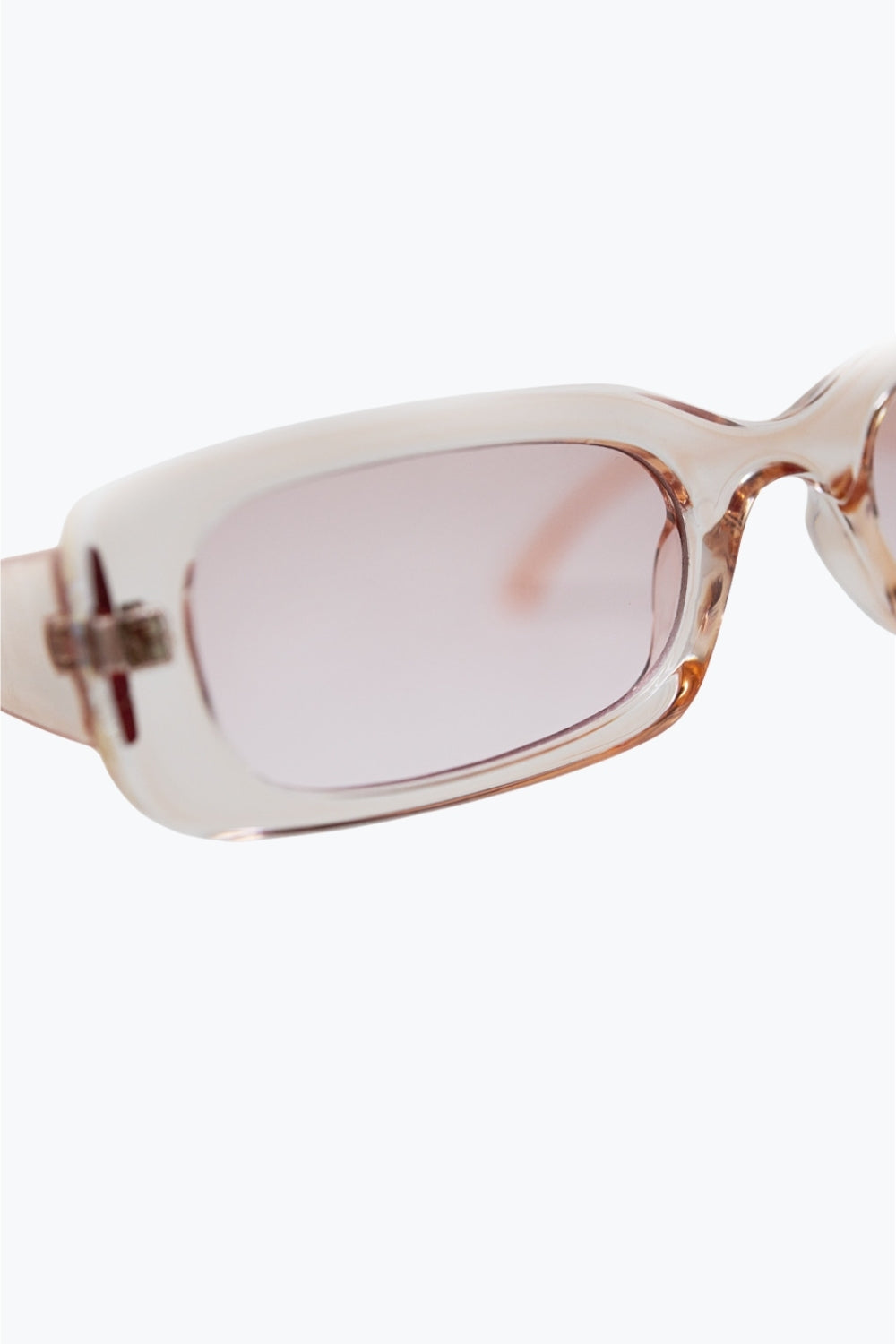 Lunettes de soleil rectangulaires roses transparentes avec verres fumés roses