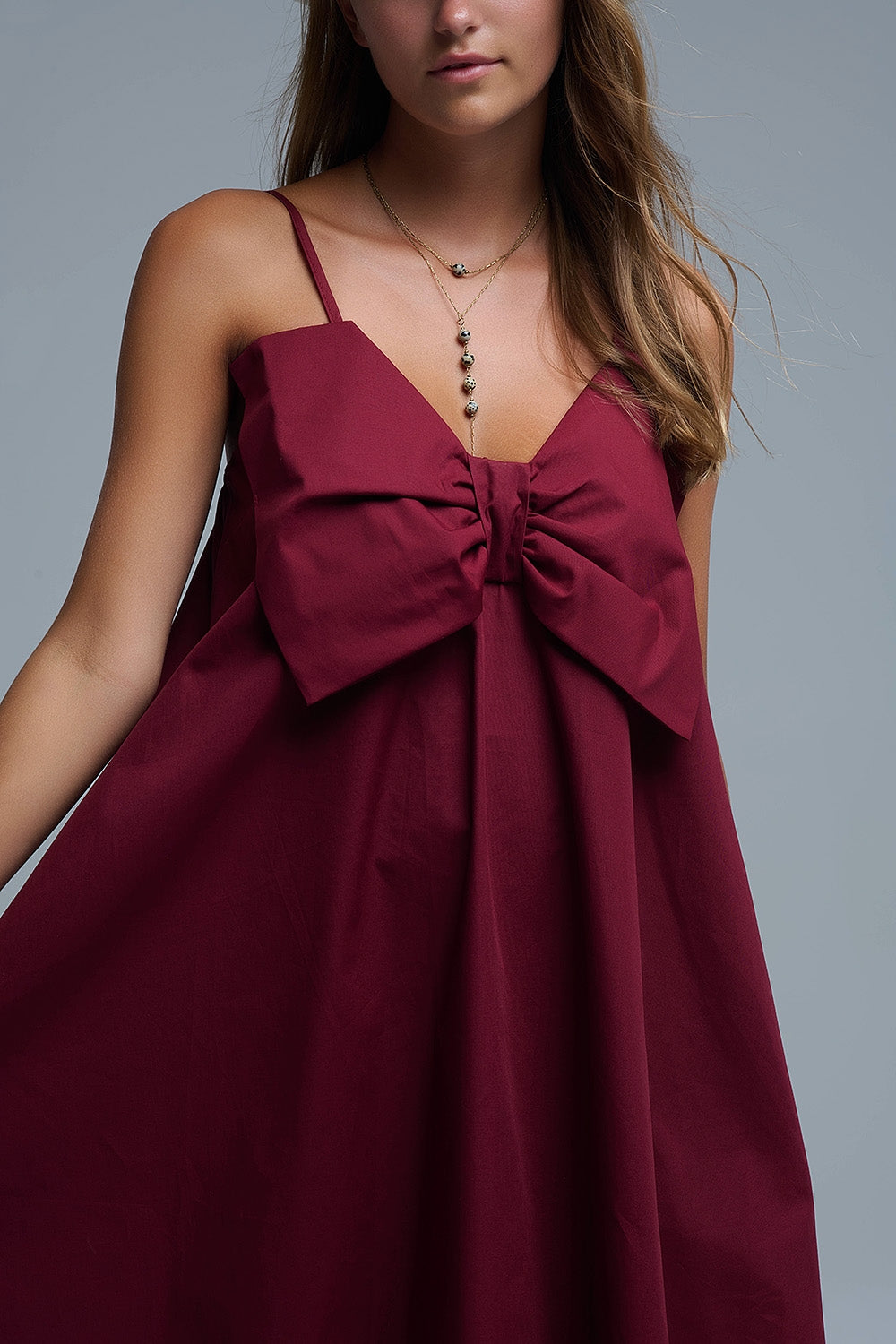 Mini robe en popeline bourguignonne avec un gros nœud