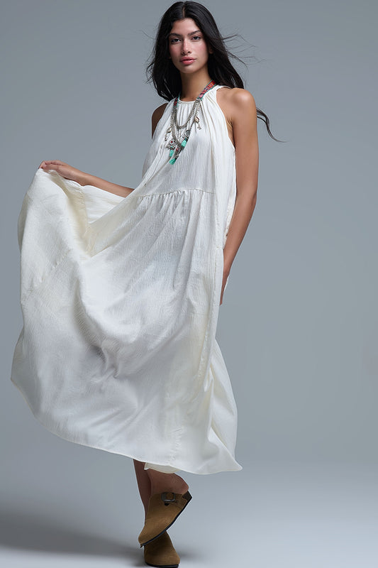 Robe longue à col licou et coutures apparentes en crème