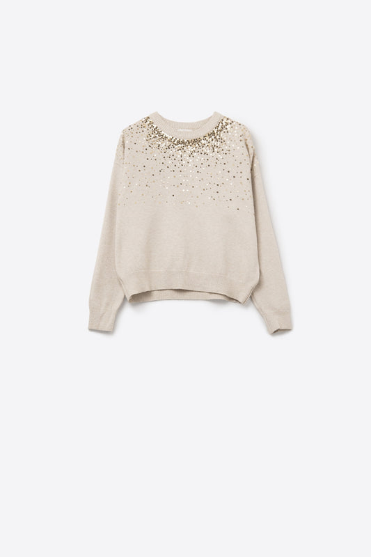 Pull en maille douce crème orné de paillettes sur le devant