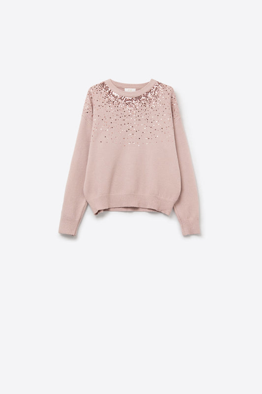 Pull en maille douce rose rehaussé de paillettes sur le devant