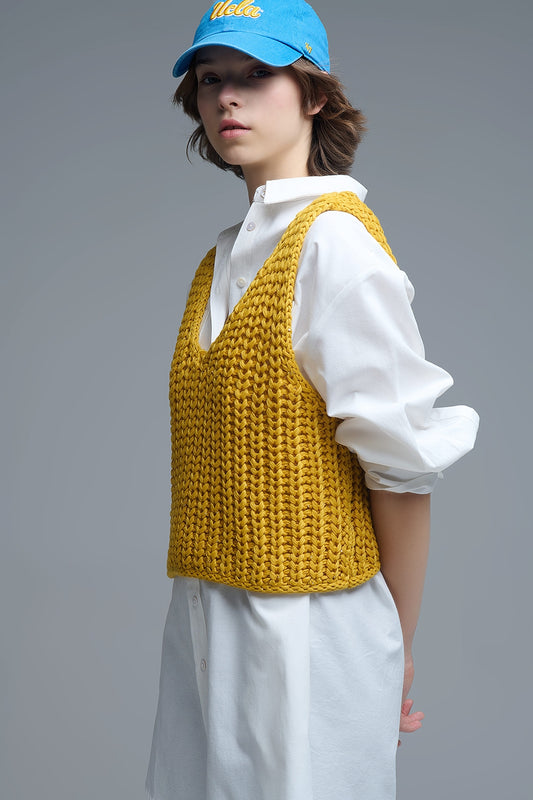 Gilet crocheté jaune avec fils pailletés