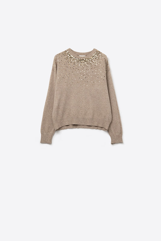 Pull en maille douce beige rehaussé de paillettes sur le devant
