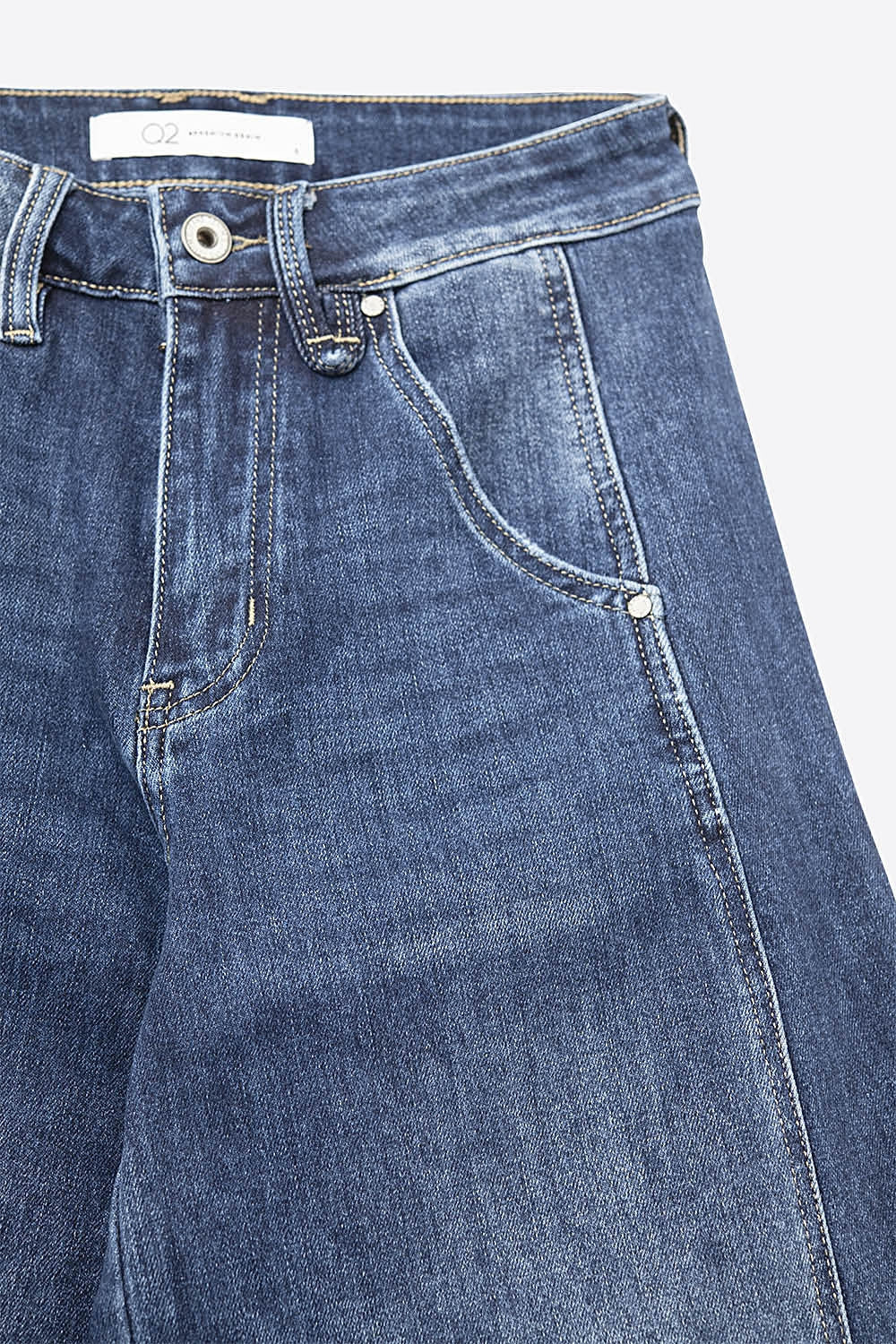 Jeans à jambe extra-large en délavage moyen avec poches latérales