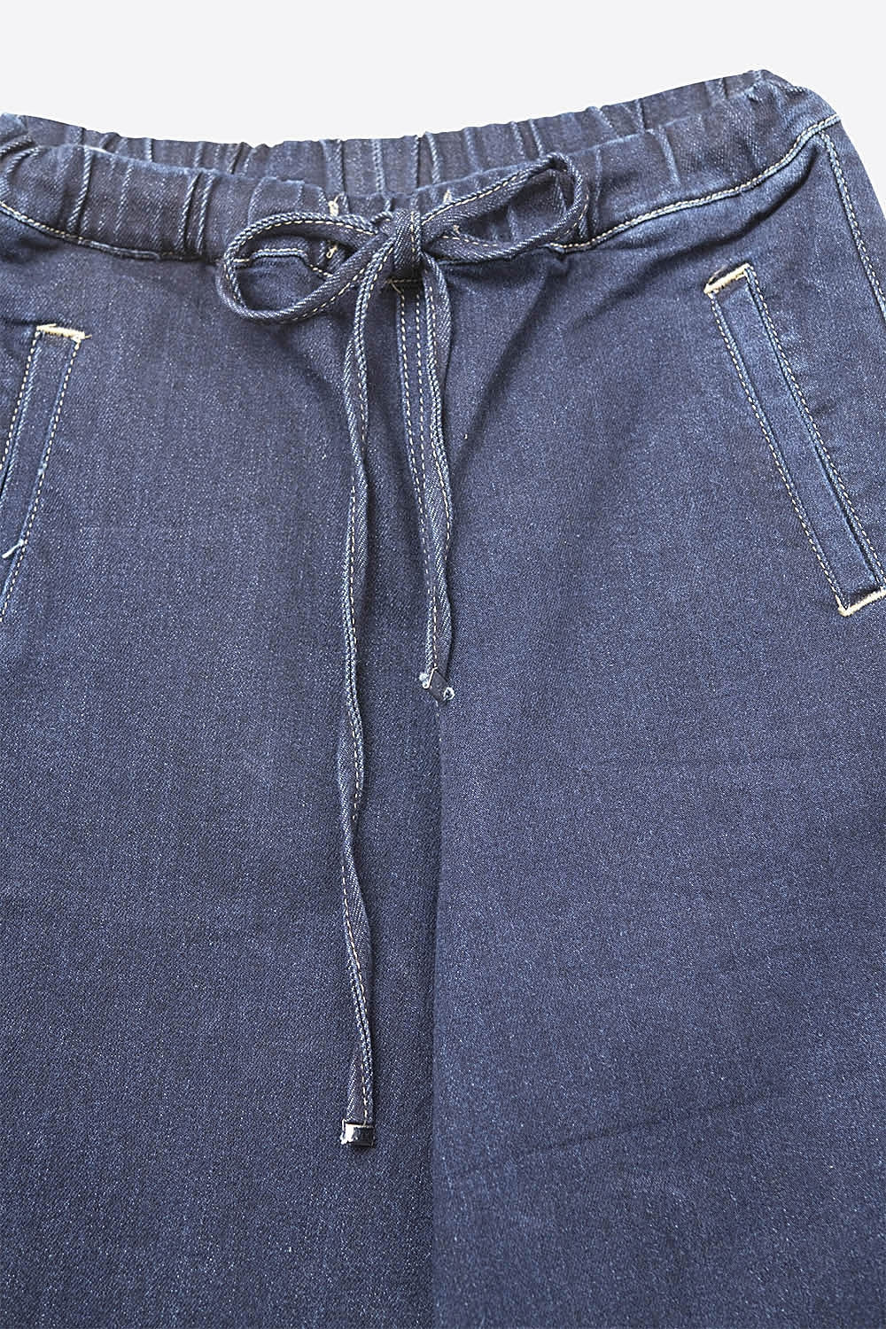 Jeans en denim bleu à jambes larges et à nouer