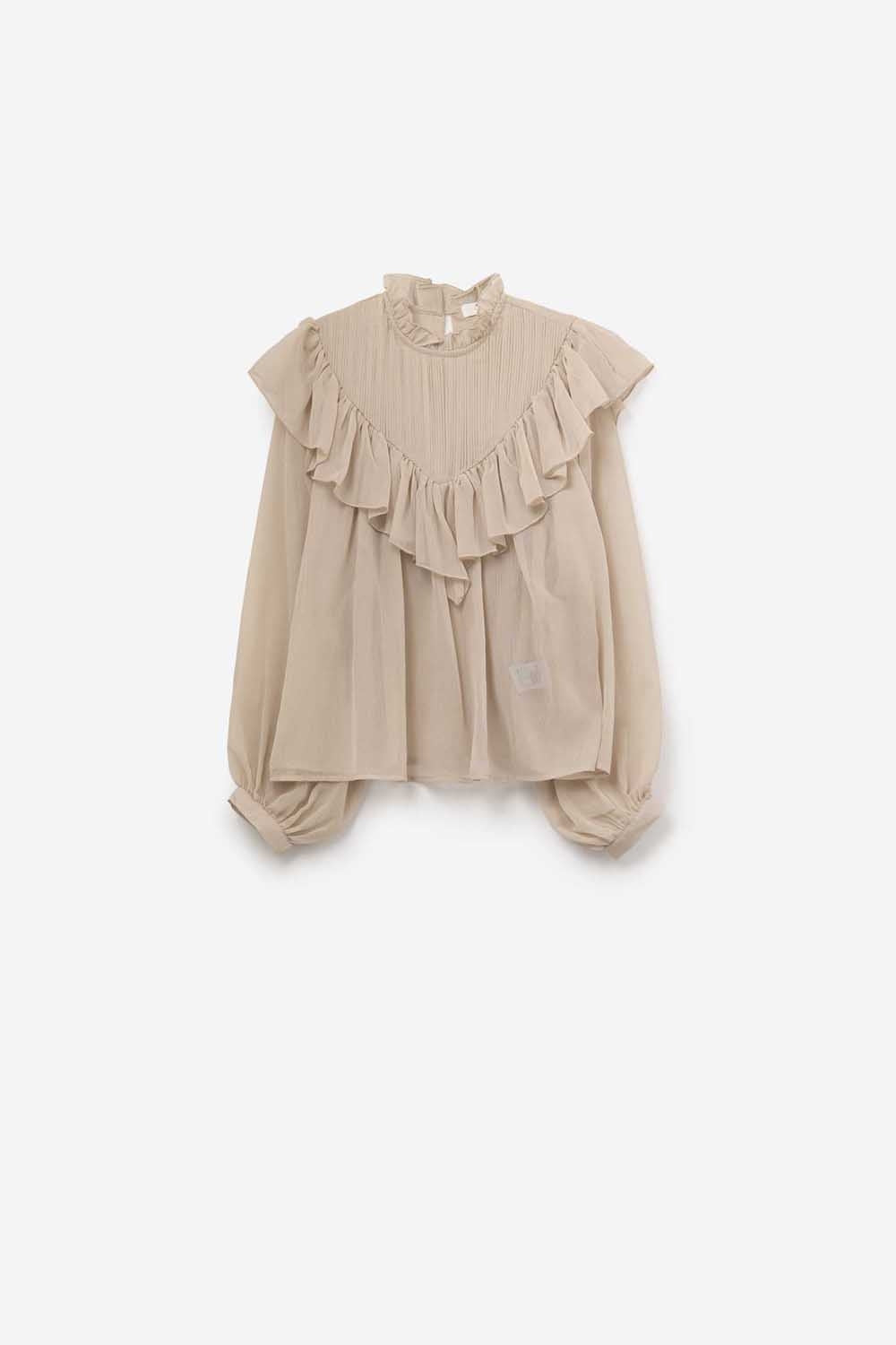 Chemisier romantique beige à manches longues et volants en mousseline de soie