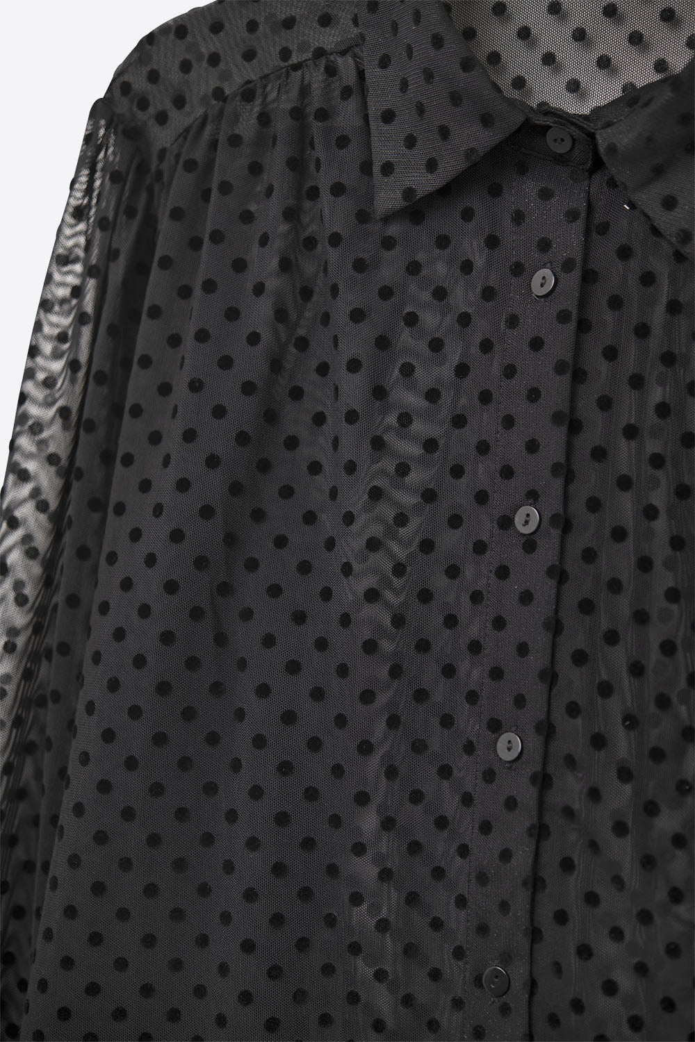 Chemise boutonnée à pois noire en mousseline de soie