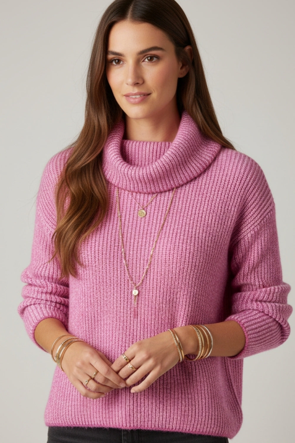 pull fuchsia en maille côtelée à col roulé
