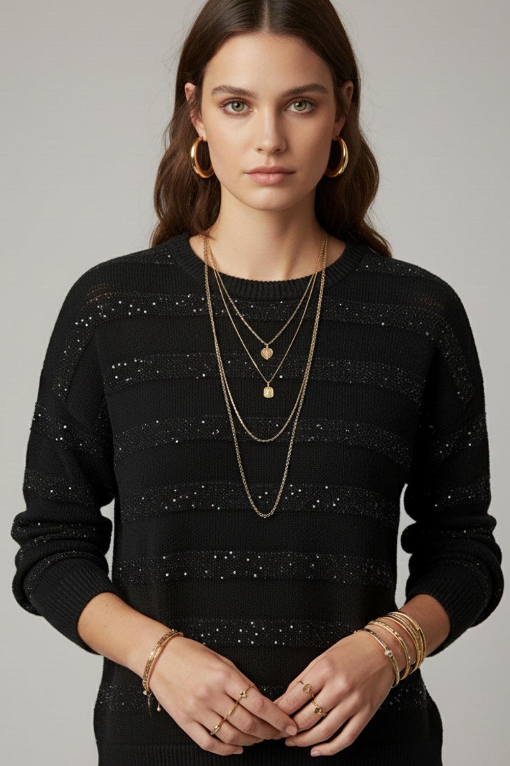 Pull en tricot rayé noir avec paillettes