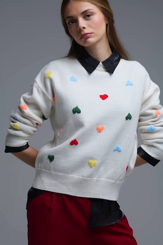 Pull crème avec cœurs brodés multicolores