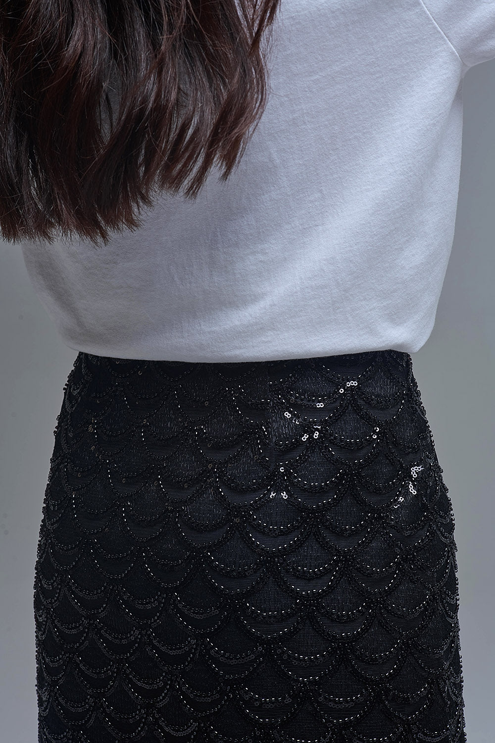 Minijupe à paillettes festonnées noire