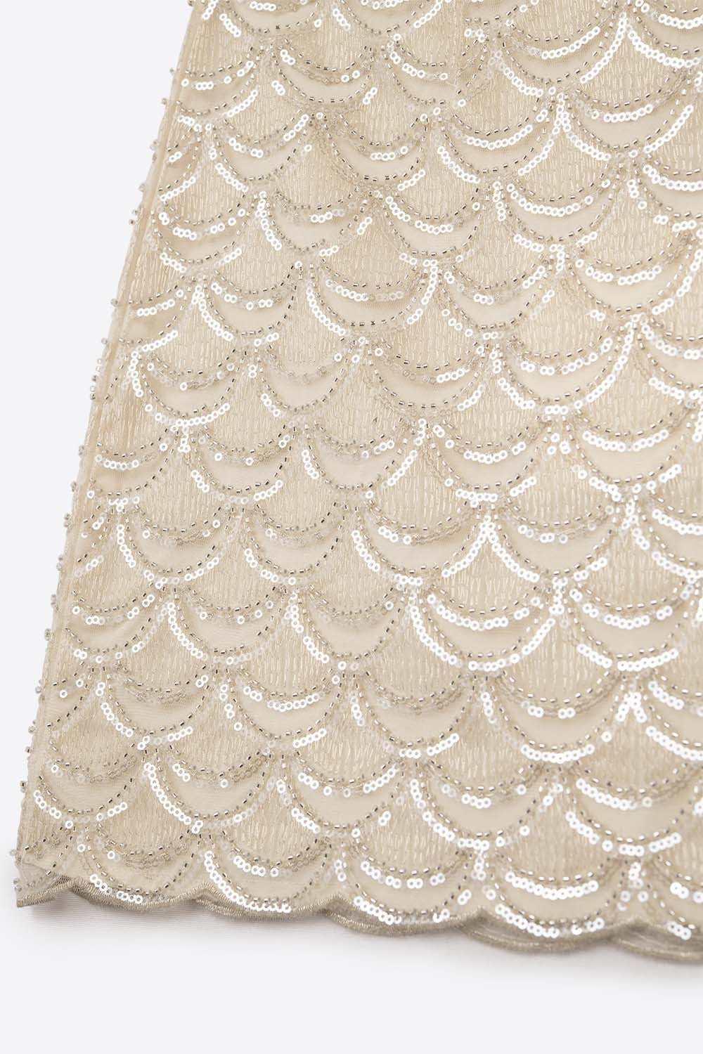 Minijupe à paillettes festonnées crème