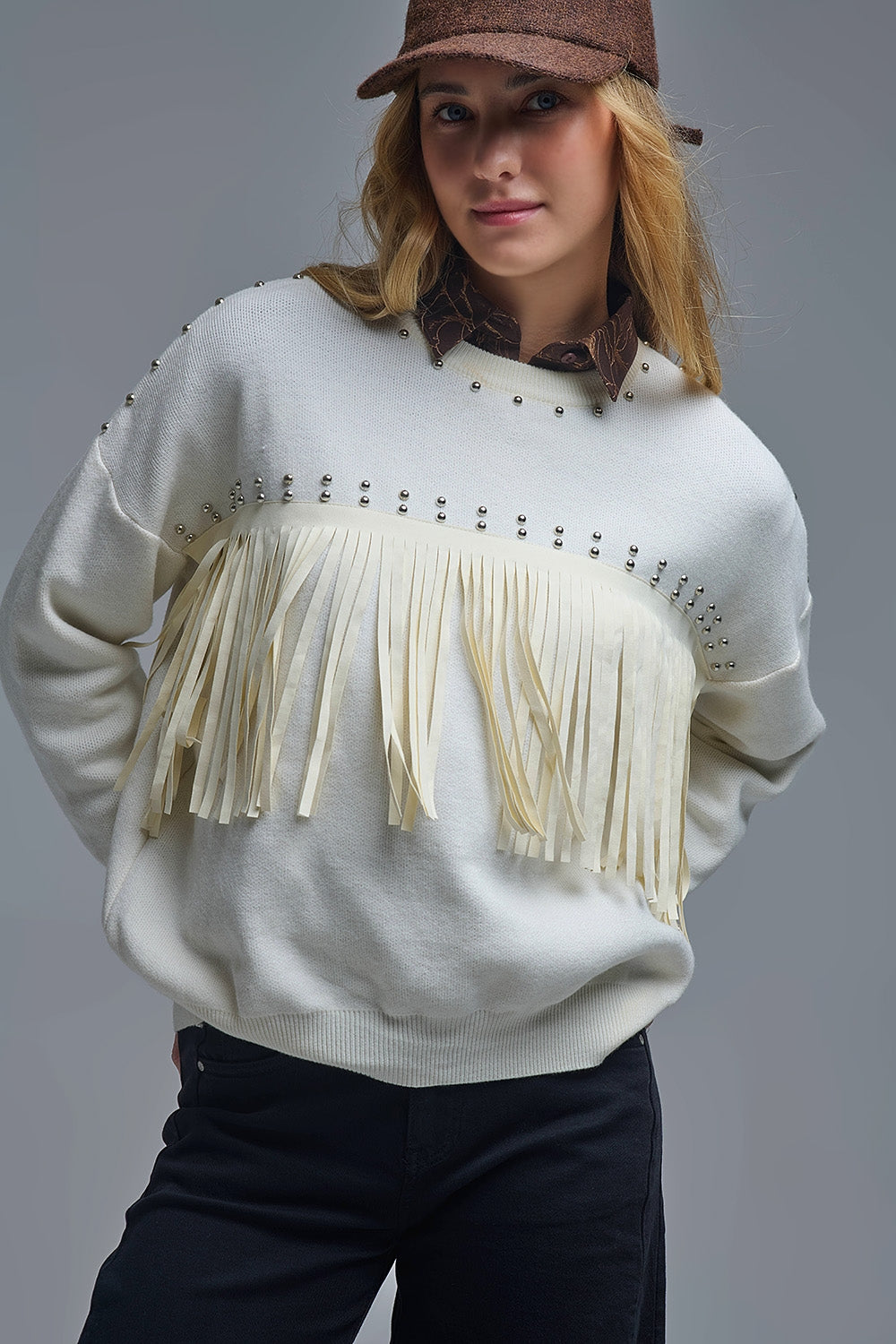 Pull élégant en tricot blanc avec franges