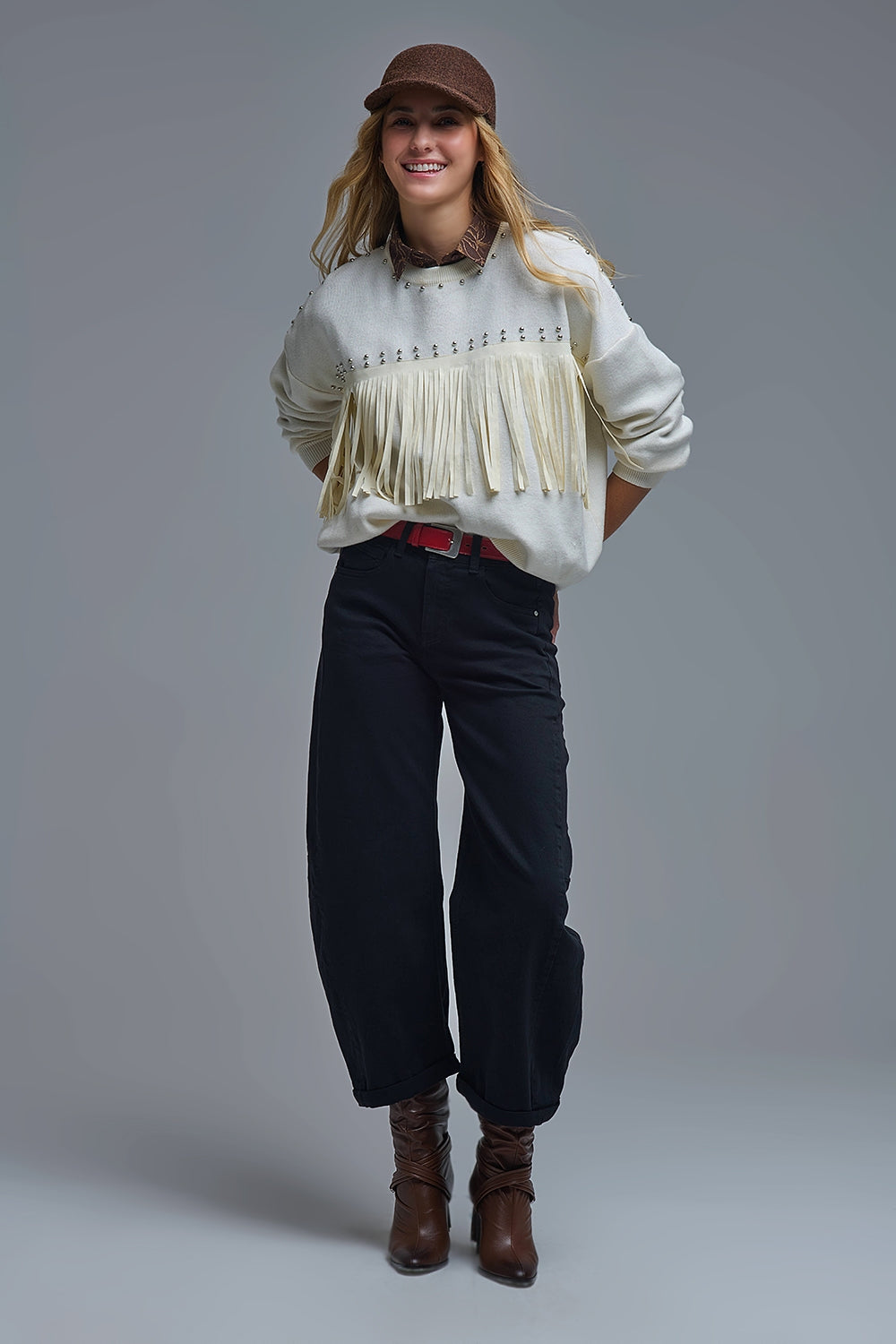 Pull élégant en tricot blanc avec franges