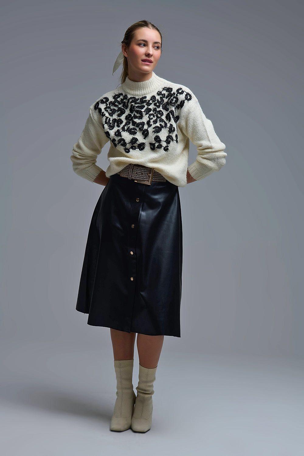 Pull blanc en tricot avec motif abstrait