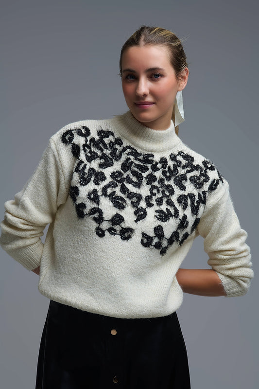 Pull blanc en tricot avec motif abstrait