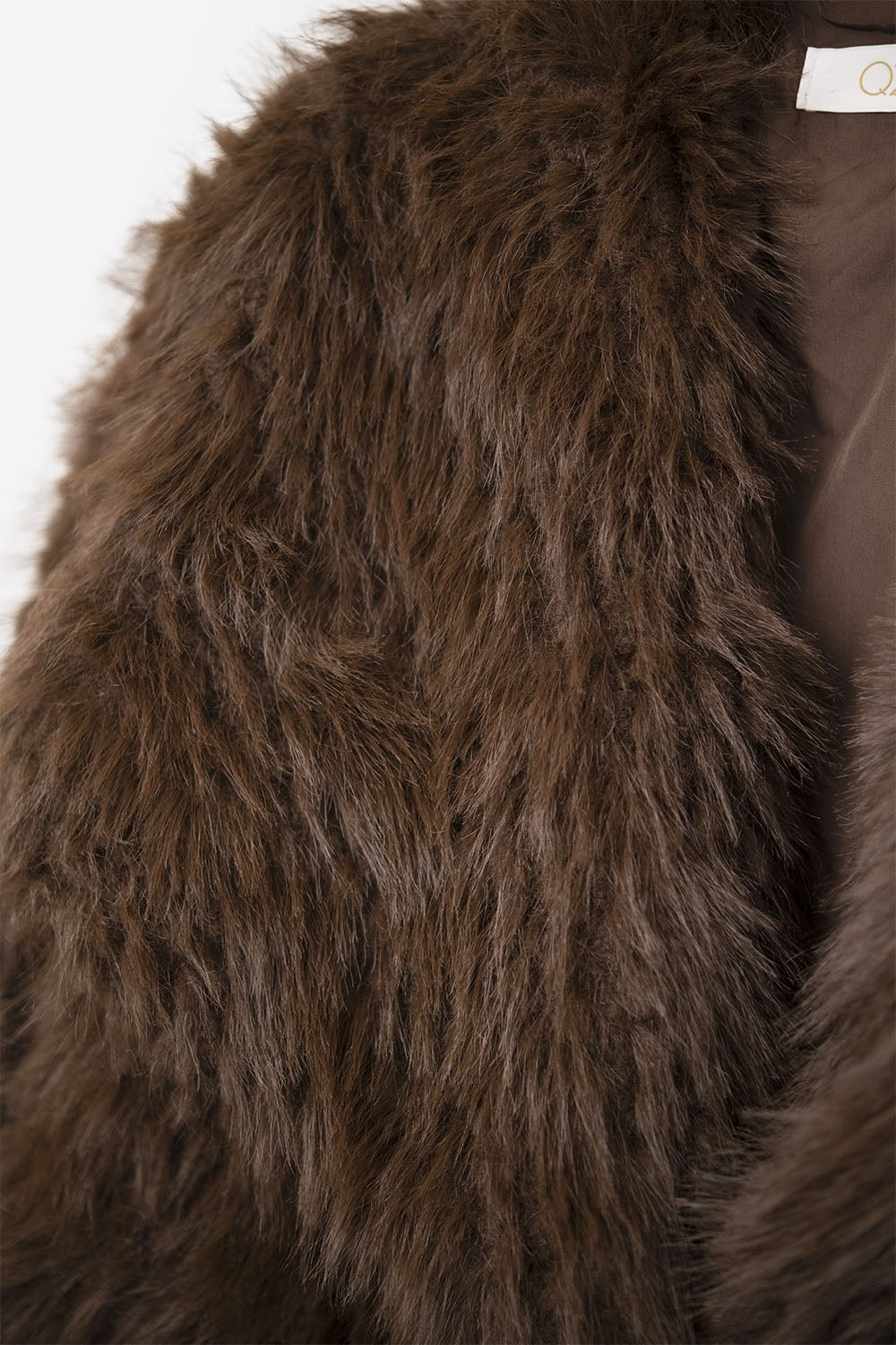 Veste chic en fausse fourrure marron à col large