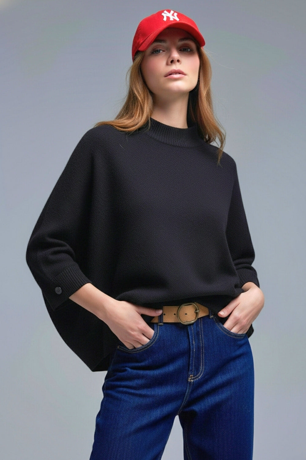 Pull noir en maille avec manches et boutons