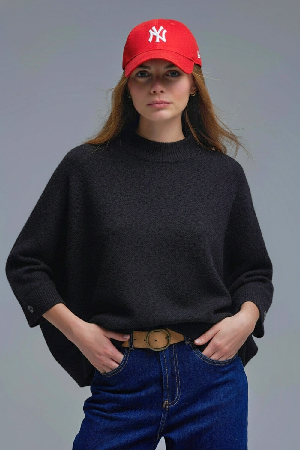 Pull noir en maille avec manches et boutons