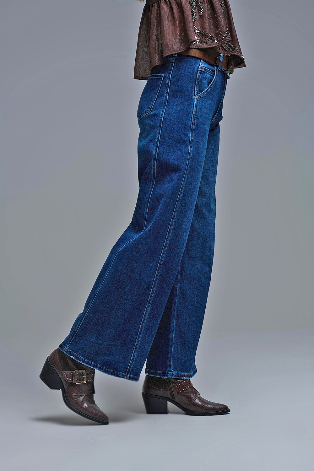 Jeans à jambe extra-large en délavage moyen avec poches latérales