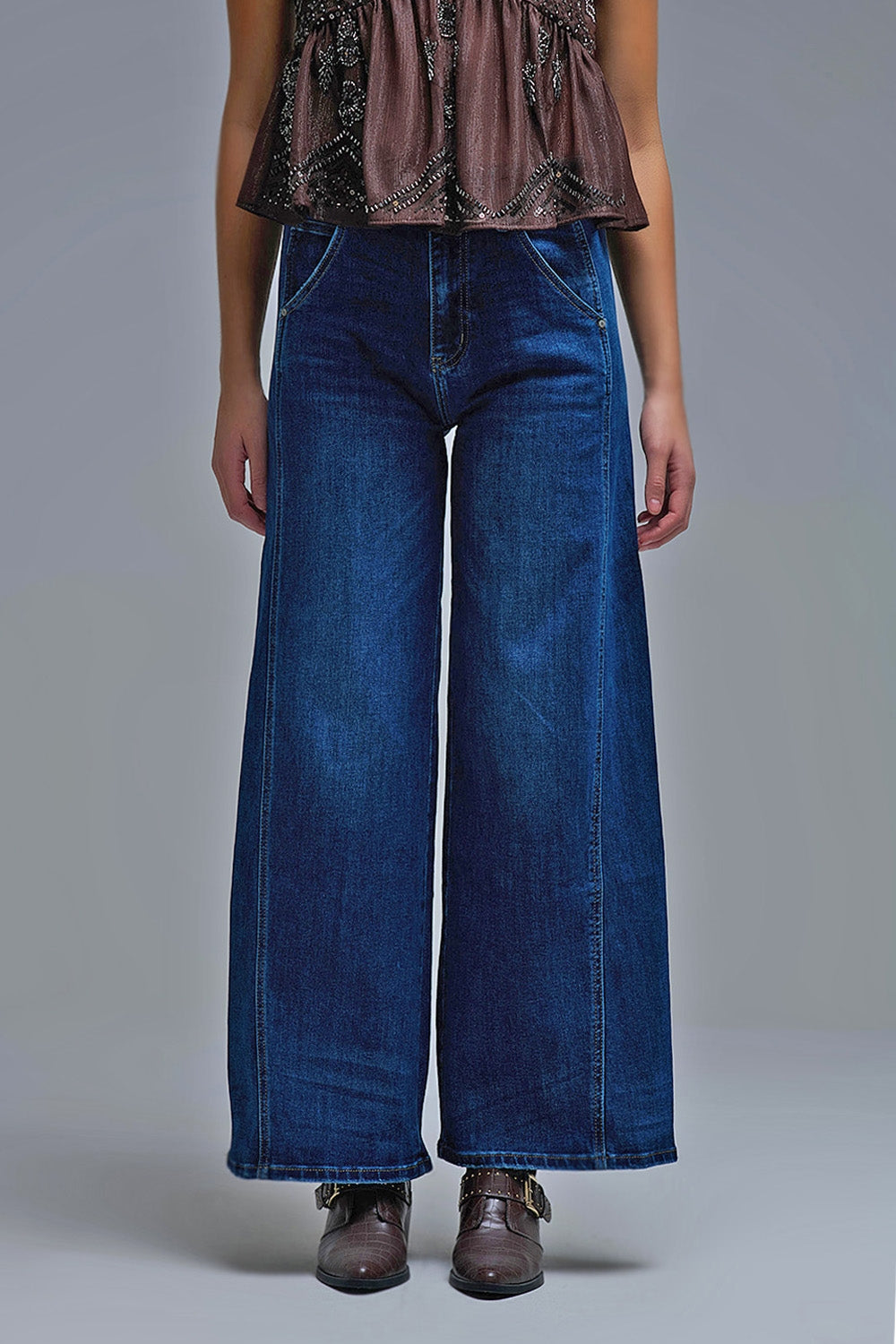 Jeans à jambe extra-large en délavage moyen avec poches latérales