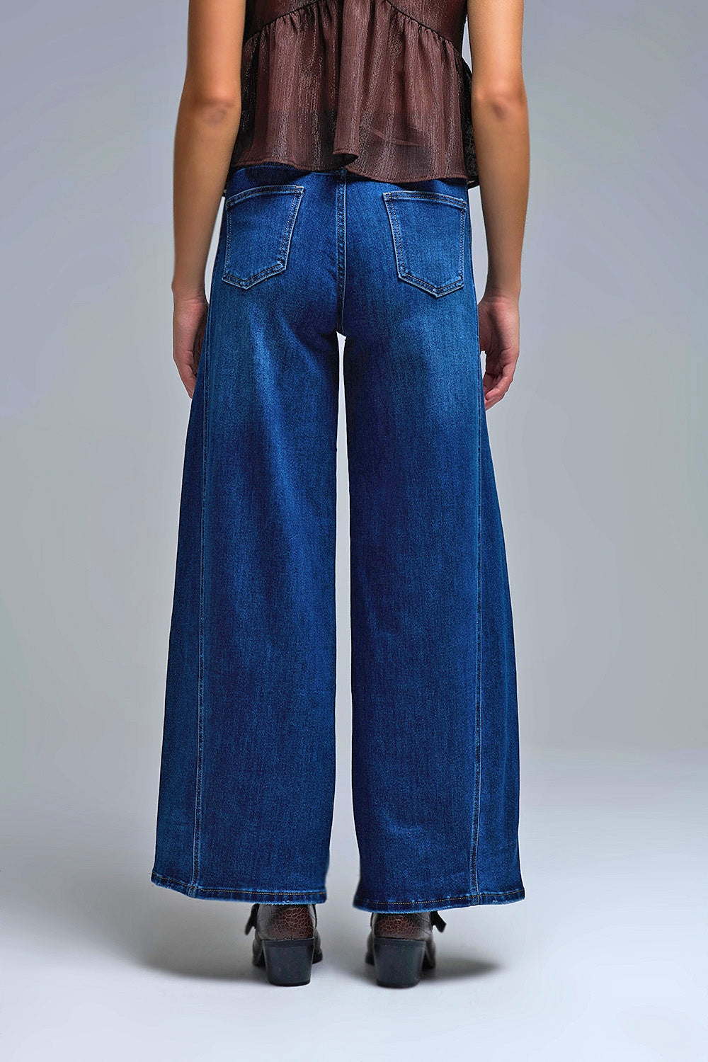 Jeans à jambe extra-large en délavage moyen avec poches latérales
