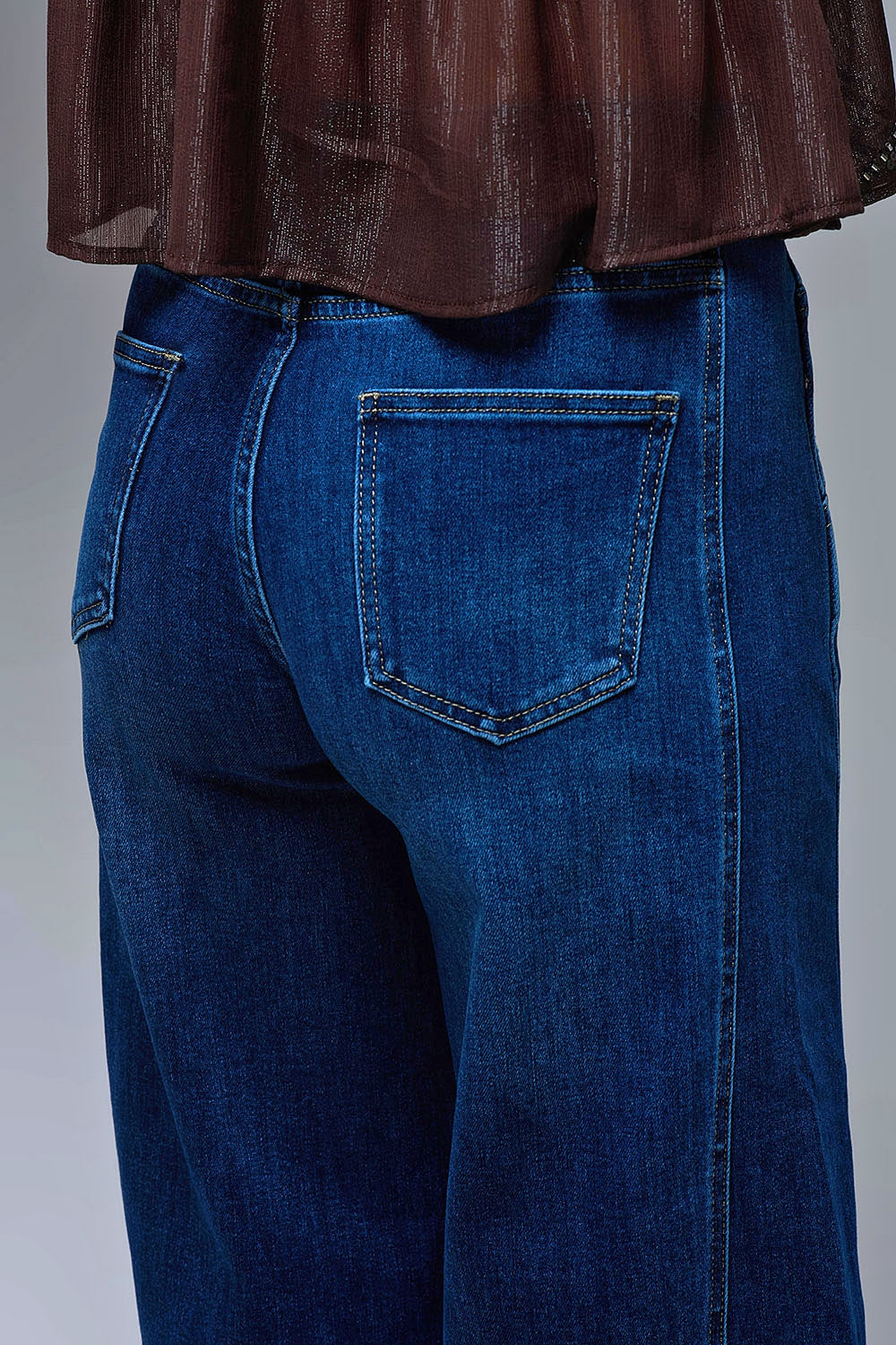 Jeans à jambe extra-large en délavage moyen avec poches latérales