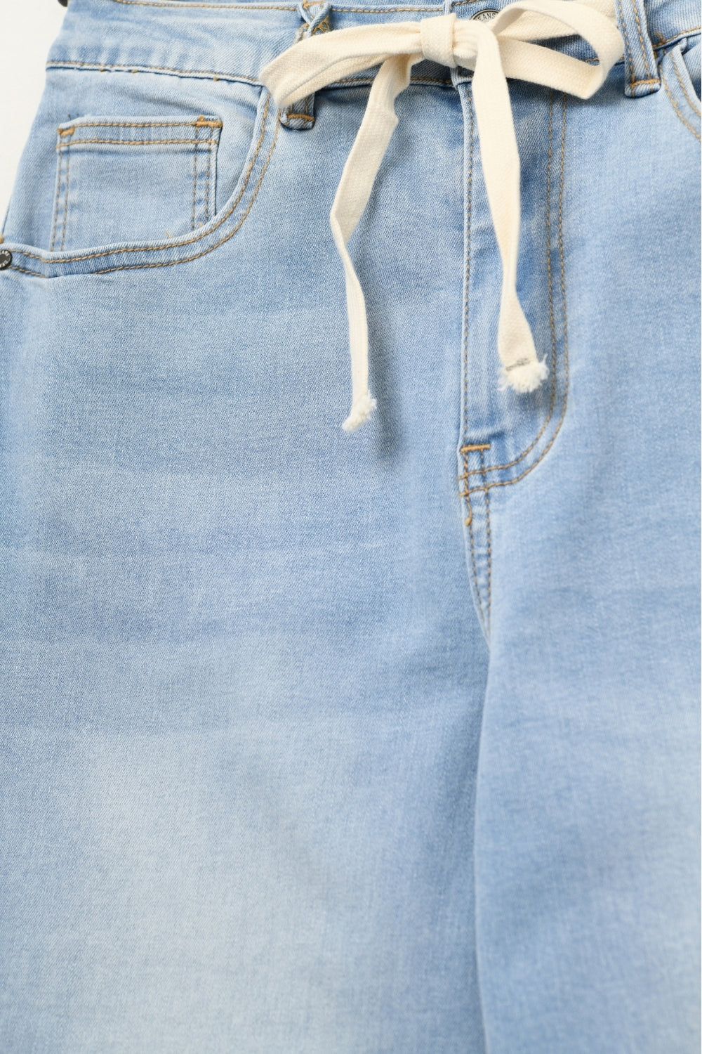 Jean à jambe large délavé avec taille ajustable à cordon de serrage