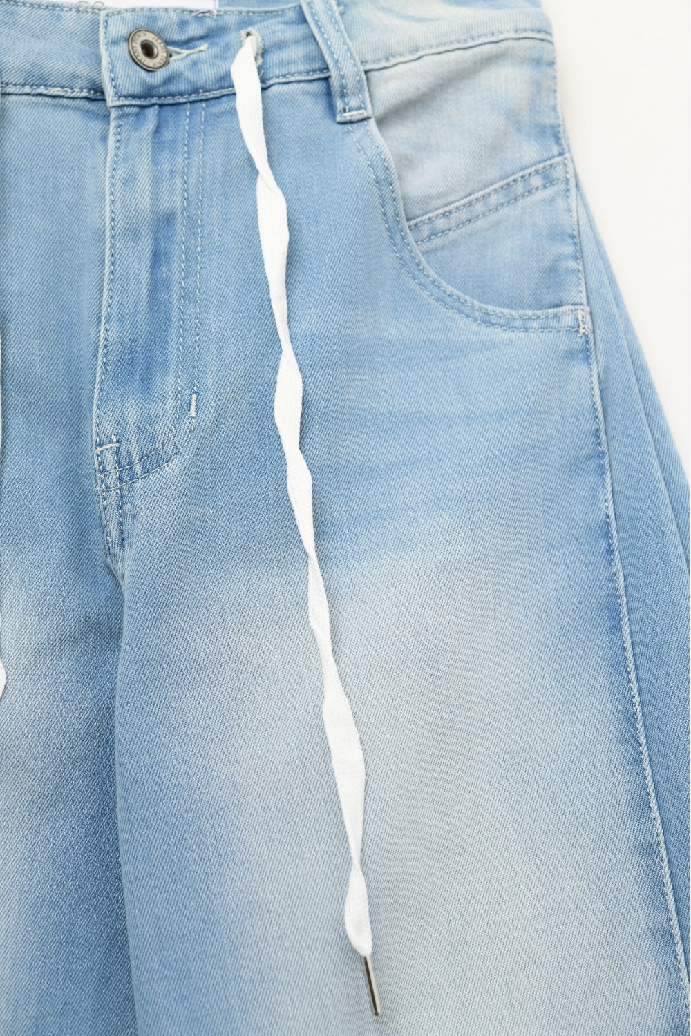 Jeans en denim bleu clair à cordon de serrage coupe décontractée