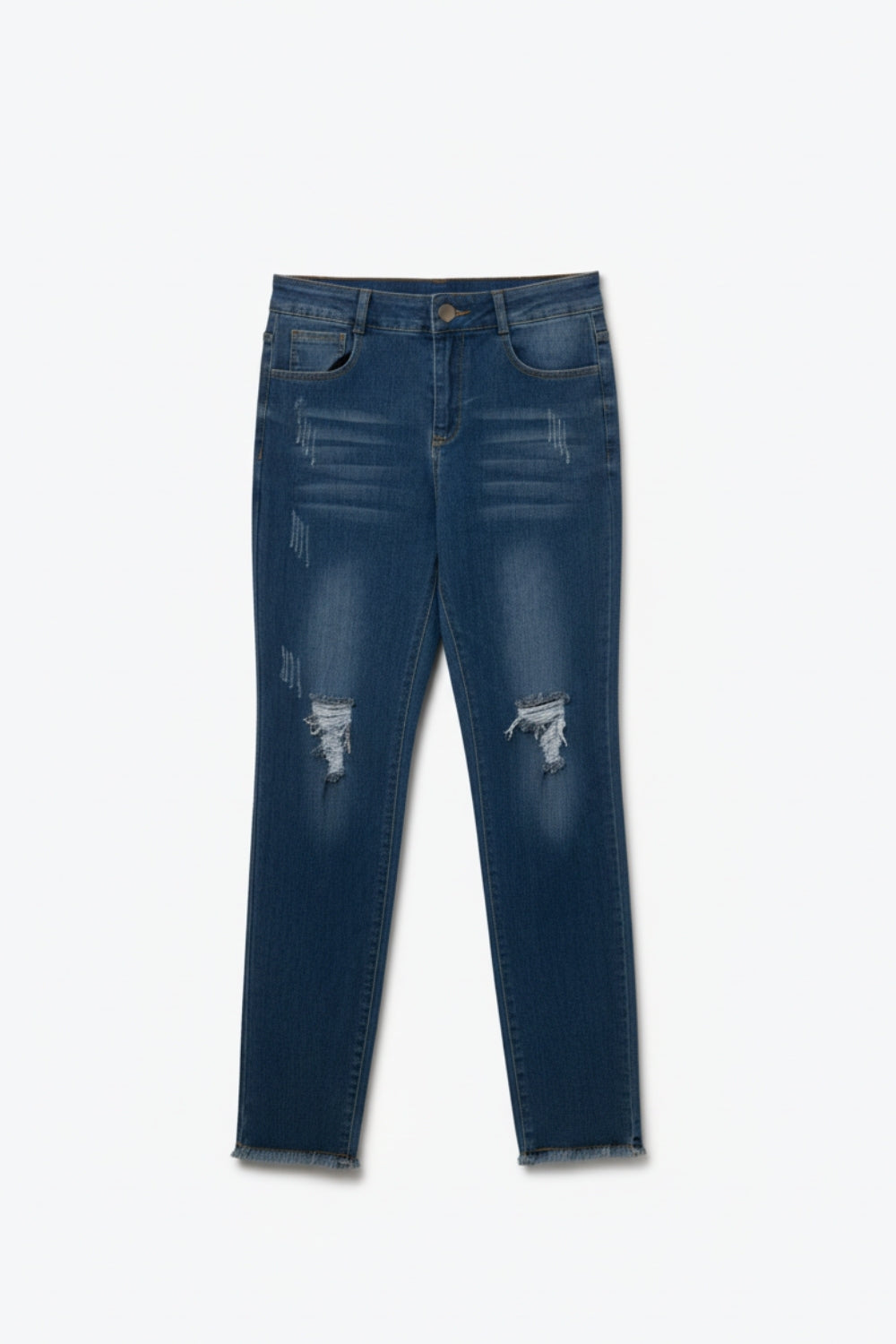 Jean skinny délavé à bords bruts