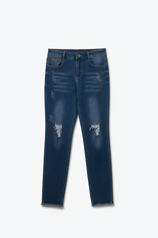 Jean skinny délavé à bords bruts