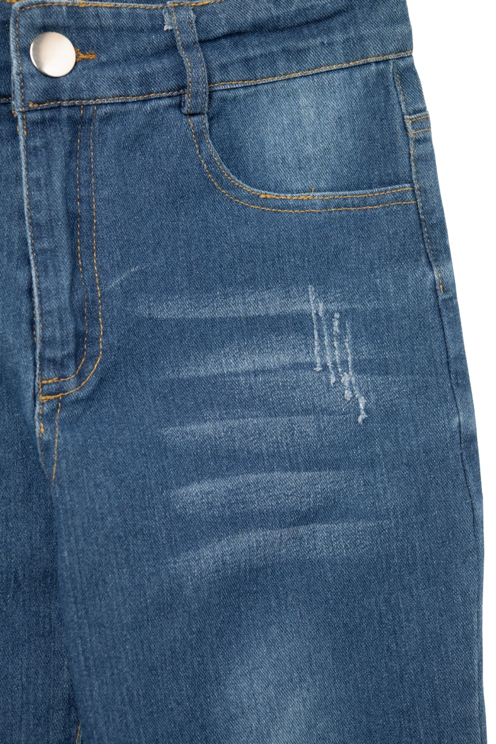 Jean skinny délavé à bords bruts