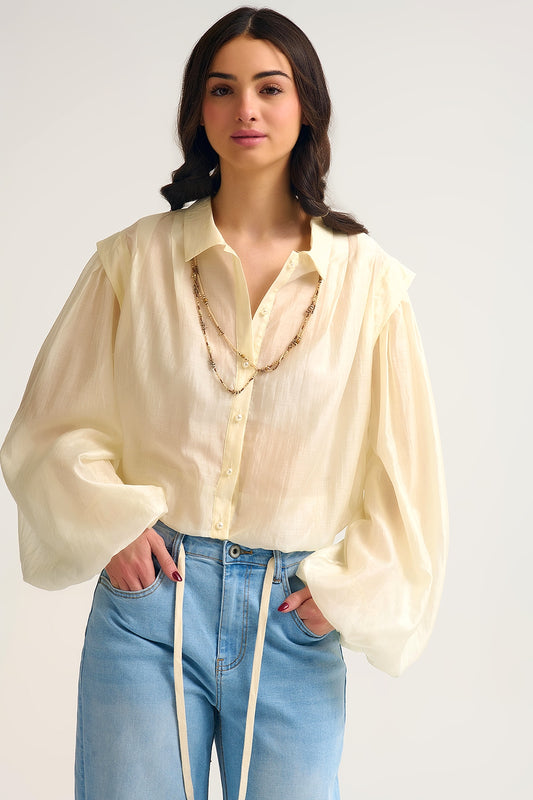 Chemisier en soie Tencel crème avec manches ballon et boutons en nacar
