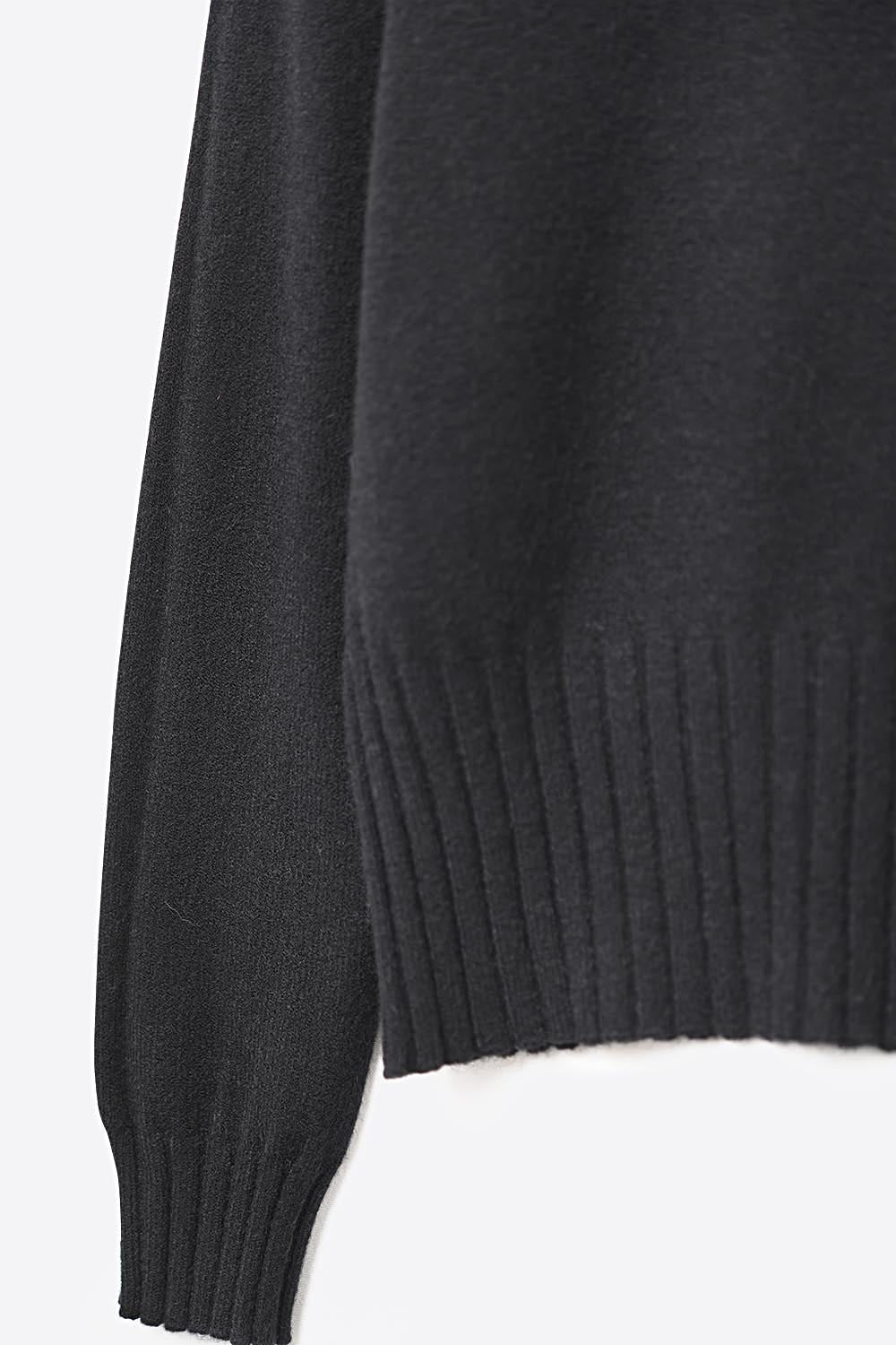 Pull noir en maille douce avec poignets et col côtelés