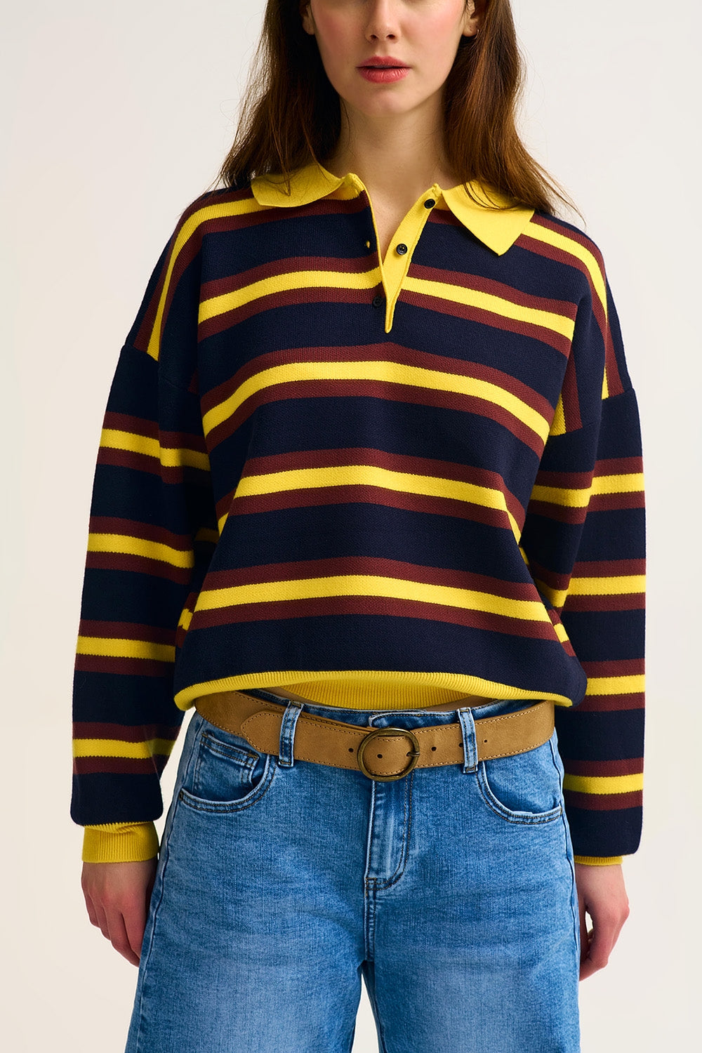 Polo en tricot rayé jaune à coupe décontractée