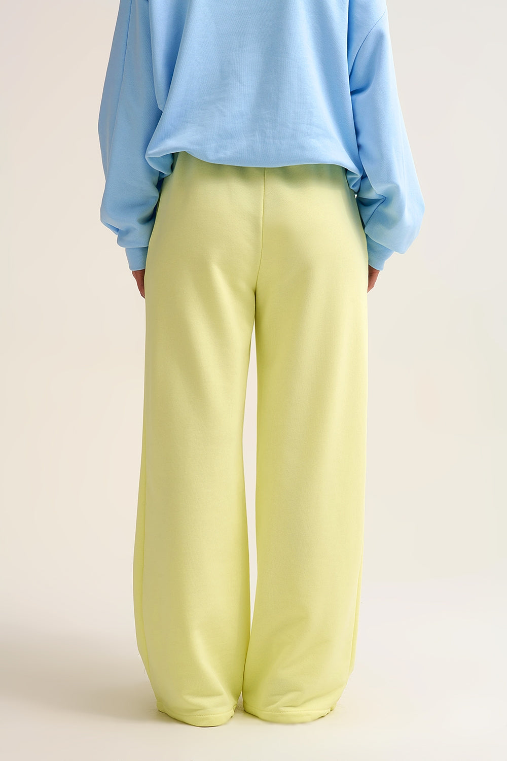 Pantalon de survêtement à coupe droite en tricot jaune avec taille élastique et cravate