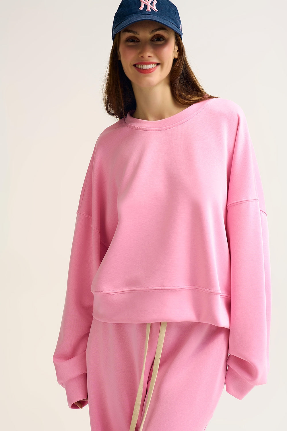Sweatshirt basique à col ras du cou et épaules tombantes en rose