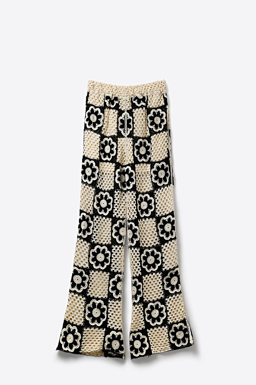 Pantalon évasé en patchwork crochet noir et crème avec motif floral