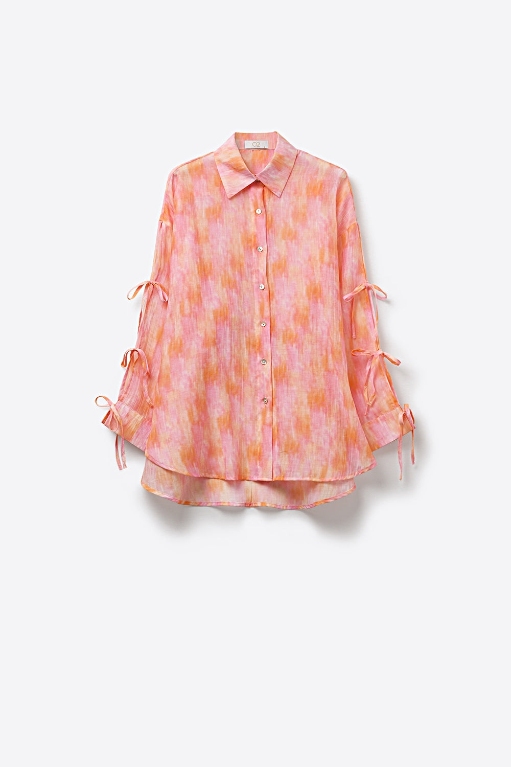 Chemise à boutons surdimensionnée rose avec manches nouées