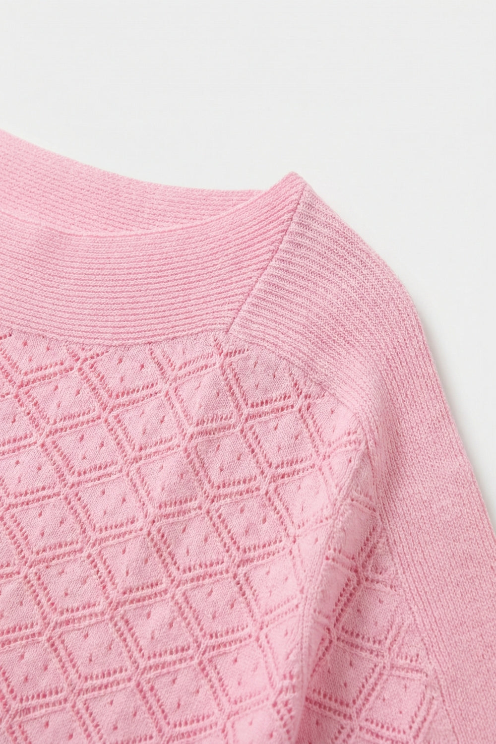 Pull à manches courtes en maille texturée motif rose