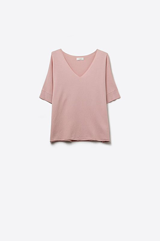 Pull en maille rose poudré à col en V et coupe décontractée