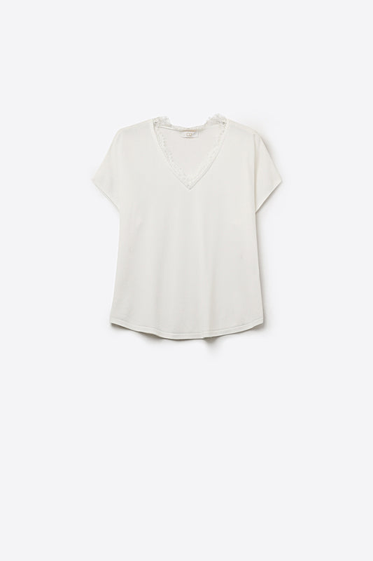 Pull en maille fine et douce avec col en V et bordures en dentelle en blanc