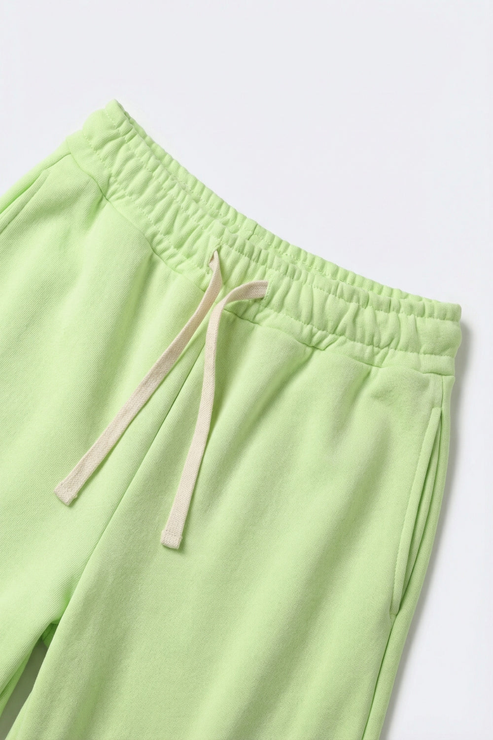 Pantalon de survêtement en tricot vert avec taille élastique et cravate
